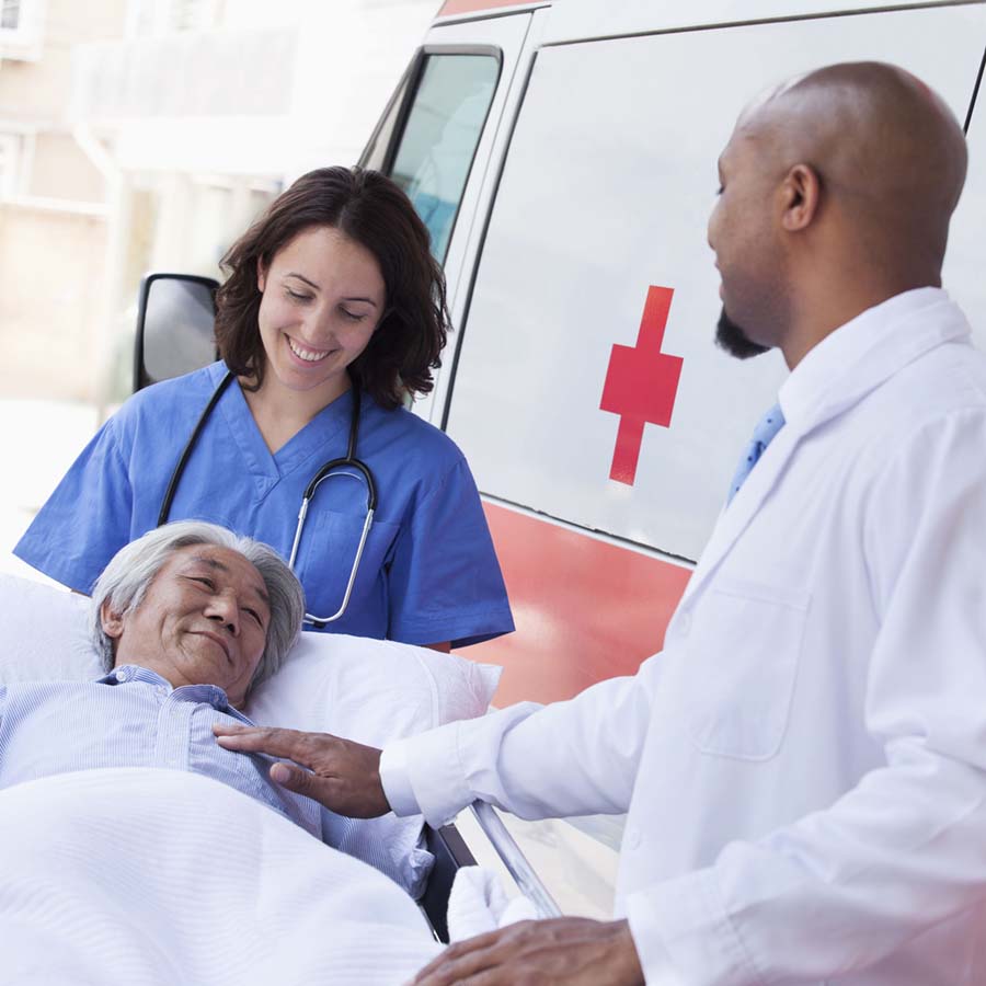 man getting out of ambulance on a stretcher